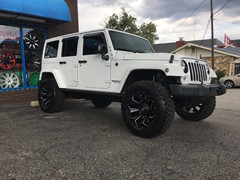 2015 Jeep Wrangler with a 3 inch Zone Offroad lift kit with 20x10 Fuel Offroad Assault wheels and 35 inch Radar Renegade MT tires