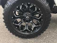 2015 Jeep Wrangler with a 3 inch Zone Offroad lift kit with 20x10 Fuel Offroad Assault wheels and 35 inch Radar Renegade MT tires