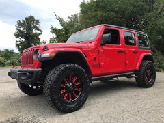 2018 Jeep Wrangler JL, 
2.5in lift, 20x9 -0 offset Fuel Hardlines in Candy Red,with 35x12.50x20 Nitto Ridge Grapplers
