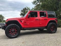 2018 Jeep Wrangler JL, 
2.5in lift, 20x9 -0 offset Fuel Hardlines in Candy Red,with 35x12.50x20 Nitto Ridge Grapplers
