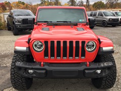 2018 Jeep Wrangler JL with 2.5 inch Rough Country lift kit and 20x10 Fuel Assault wheels and 35 Nitto Ridge Grappler tires and Rough Country LED lighting and nerf steps.