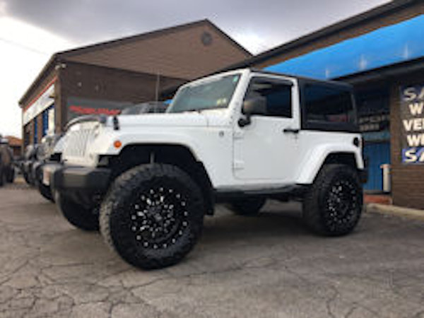 Jeep Wrangler with 3 inch Rough Country lift kit and 18 inch Fuel Offroad Krank wheels and 35 inch Nitto Ridge Grappler tires 