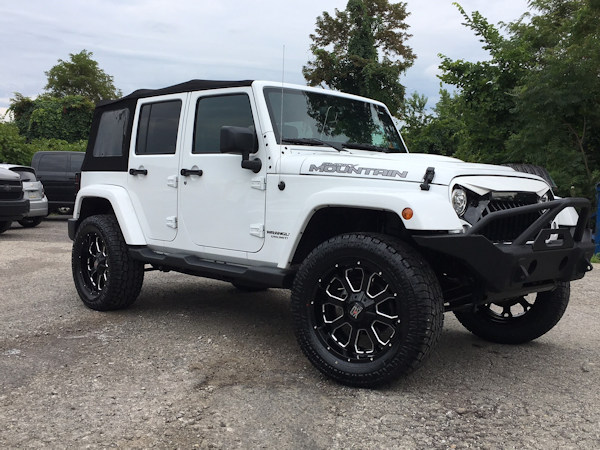 2017 Jeep Wrangler with 2 inch Teraflex lift kit with 20x9 XD 825 Buck wheels and 305/55/20 ProComp AT tires 