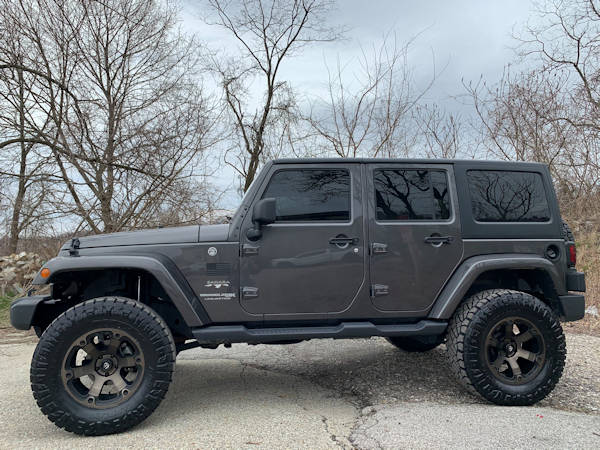 Jeep JK  with 2.5in Roughcountry coil lift, 18x9 Fuel Beast & 35x12.50x18 Nitto Ridge Grapplers 