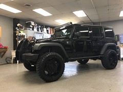 2016 Jeep Wrangler with a 4 inch Zone Offroad lift kit and 22x10 Moto Metal MO977 wheels with 35 inch Atturo Trail Blade MT tires.  Aries grille guard, Heise 50 LED light bar, Racesport LED headlights and fog lights.  Full JL Audio system with custom e...