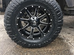 2016 Jeep Wrangler with 4 inch Zone Offroad lift kit withFox shocks and 20x10 Fuel Maverick wheels with 37 inchNitto Ridge Grappler tires and Teraflex HD spare tire mount