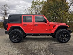 2018 Jeep Wrangler JL with 2.5 Rough Country lift kit and 20x9 Fuel Offroad Assault wheels with 35 inch Nitto Ridge Grappler tires and Rough Country nerf bars and Rough Country LED light bar and pod lights