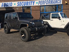 2017 Jeep Wrangler with a 4 inch Zone Offroad lift kit and Fox shocks and 20 inch Fuel Offroad Beast wheels and 37 inch Radar Renegade MT tires and Teraflex HD spare tire mount
