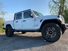 2020 Jeep Gladiator, with 2.5in Rough Country leveling kit, 20x10 Motto Folsom and 35x12.50x20 Nitto Ridge Grapplers