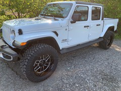 2020 Jeep Gladiator, with 2.5in Rough Country leveling kit, 20x10 Motto Folsom and 35x12.50x20 Nitto Ridge Grapplers