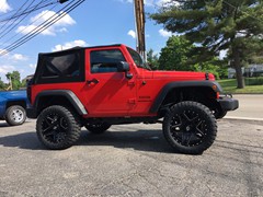 2017 Jeep Wrangler with 3 inch Zone Offroad lift kit and 20x10 LRG Pike wheels with 33 inch Radar MT tires