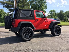 2017 Jeep Wrangler with 3 inch Zone Offroad lift kit and 20x10 LRG Pike wheels with 33 inch Radar MT tires