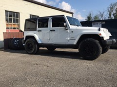 2017 Jeep Wrangler with a Terflex 2 inch lift and 17 inch Rockstar 3 wheels and 33 inch Nitto Ridge Grappler tires