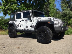 2017 Jeep Wrangler with 3.5 inch JKS J Kontrol lift kit with 18 inch XD Misfit wheels and 35 inch Atturo Trail Blade MT tires.  Rough Country front bumper and Rough Country 50 inch LED light bar.  Avery Dennison snow camo wrap.