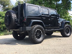 2012 Jeep Wrangler with 4 inch lift kit and 37 inch Toyo Open Country MT tires.