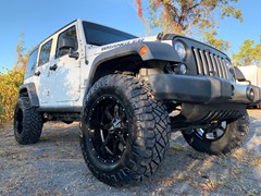 Jk  with a 4in. Zoneoffroad Kit, 20x10 Motometal Gloss Black 970’s, 37x12.50x20 Nitto Ridge Grapplers