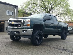 2015 Chevy Silverado with 6.5 inch Zone Offroad lift kit and 20 inch Anthem wheels with Atturo Trail Blade XT tires