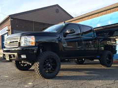 2013 Chevy Silverado 1500 with 7.5 inch Rough Country lift kit and 20x10 Fuel Offroad Coupler and 35 inch Renegade MT tires