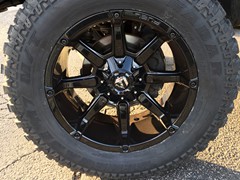 2013 Chevy Silverado 1500 with 7.5 inch Rough Country lift kit and 20x10 Fuel Offroad Coupler and 35 inch Renegade MT tires