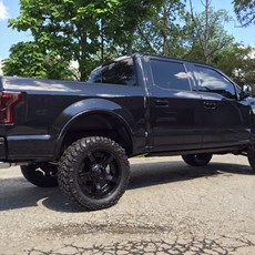 2015 Ford F-150 with 6 inch BDS lift kit, 22 inch KMC XD Rockstar 2 wheels and 35 inch Nitto Trail Grappler tires with a Borla Atak exhaustIMG_2674