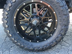 2016 Ford F-350 with 4 inch Zone Offroad lift kit with Fox shocks, 22 inch KMC XD820 Grenade wheels with 37 inch Toyo Open Country MT tires, DeeZee tool box and headache rack and Heise and Hella LED lights