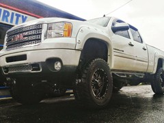 2011 GMC Sierra 2500HD Denali with 6 inch lift kit and 20 inch RBP Assassin wheels and 37x12.50x20 Mickey Thompson ATZP3 tires
