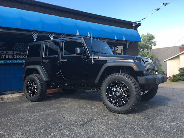 2016 Jeep Wrangler with 3 inch Zone Offroad lift kit and 20x9 KMC XD 825 wheels with 35 inch Mastercraft MXT tires 