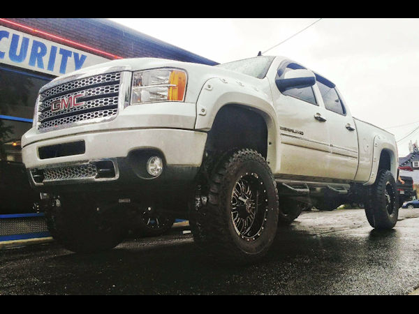 2011 GMC Sierra 2500HD Denali with 6 inch lift kit and 20 inch RBP Assassin wheels and 37x12.50x20 Mickey Thompson ATZP3 tires 