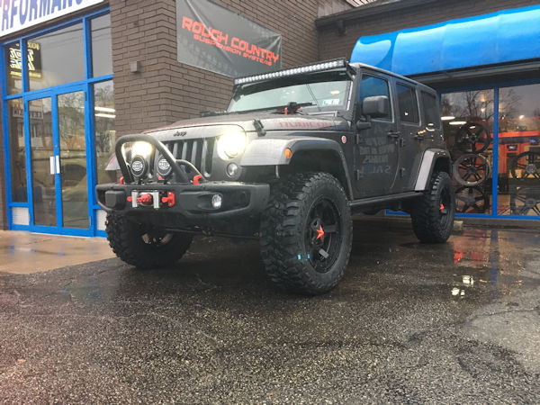 2016 Jeep Wrangler Rubicon Hardrock with 3 inch Zone Offroad lift kit and 20x9 KMC XD Rockstar 3 wheels with 35 inch Mastercraft MXT tires 