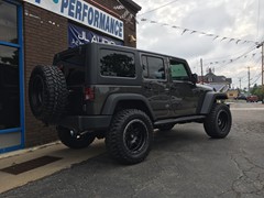 2016 Jeep Wrangler with 3 inch Zone Offroad lift kit with Fox shocks and 20x10 Fuel Offroad Anza wheels with 35 inch Mastercraft MXT tires