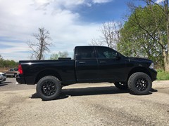 2016 Ram 1500 with 6 inch Zone Offroad lift kit and 20x10 XD Buck wheels with 37 inch Radar MT tires