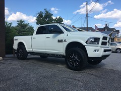 2017 Ram 2500  with Zone Offroad leveling kit and 20x9 0 offset XD825 Buck wheels and 35 inch General Grabber AT2 tires