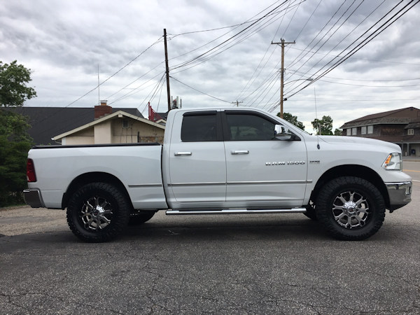 2012 Ram 1500 with Bilstein 5100 adj. front struts and Daystar 1.5 inch rear coil spacers and 20 inch XD Buck wheels with 35 inch Nitto Ridge Grappler tires 