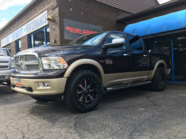 2011 Ram 1500 with Bilstein front adjustable shocks and Readylift rear coil spacer and 20 inch Moto Metal MO970 wheels with 35 inch Nitto Ridge Grappler tires 