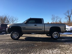 Ram 2500with Rough Country leveling kit and 20x12 KMC XD Fury wheels and 33 inch Radar Renegade MT tires