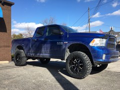 2017 Ram 1500 with 6 inch Rough Country Lift kit and 20x10 Moto Metal MO970 wheels and 35 inch Federal Couragia tires