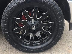 2019 Ram 1500 with 20x9 Fuel Offroad Battleaxe wheels and 33 inch Nitto Ridge Grappler tires