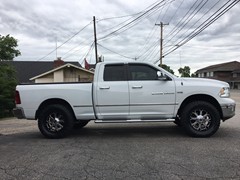2012 Ram 1500 with Bilstein 5100 adj. front struts and Daystar 1.5 inch rear coil spacers and 20 inch XD Buck wheels with 35 inch Nitto Ridge Grappler tires