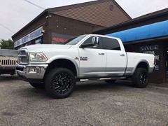 2016 Ram 2500 with Rough Country leveling kit and 20x9 Moto Metal MO988 wheels with 35 inch Toyo Open Country ATII tires
