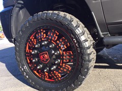 2012 Ram 3500 with full Matte Black vinyl wrap, custom red emblems, 24 inch American Force Dolla wheels (custom painted) with 37x13.50x24 Toyo Open Country MT tires.  Custom made Oracle headlights, Fog Lights, and LED light bar