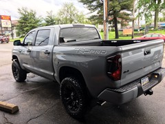 2017 Toyota Tundra TRD Pro with 4 inch Readylift lift with 20 inch Fuel Vapor wheels and 35 inch Nitto Ridge Grappler tires.  Fab Fours Vegance front bumper with Rigid Industries LED light bar and Dually fog lights and Racesport HID kit.  Amp Research 