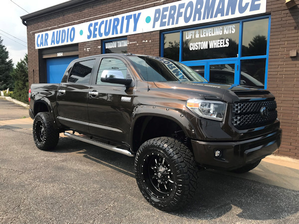 2018 Toyota Tundra with a 6in. RoughCountry Lift, 20x10 Fuel Kranks,35x12.50x20 Nitto Ridge Grapplers and Custom Painted Bushwacker pocket flares 