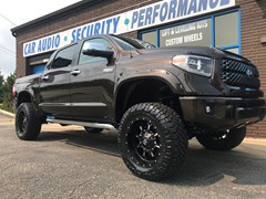 2018 Toyota Tundra with a 6in. RoughCountry Lift, 20x10 Fuel Kranks,35x12.50x20 Nitto Ridge Grapplers and Custom Painted Bushwacker pocket flares